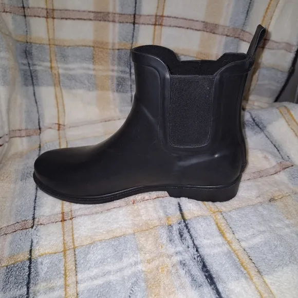 A pair of J. Crew Kenton Chelsea boots in a men's size 10. Like new condition