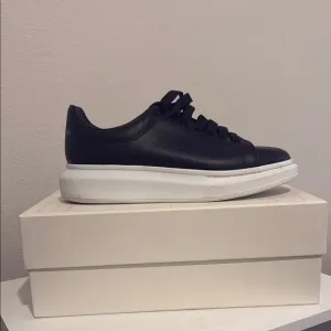 Alexander McQueen Black and White Luxury Sneakers