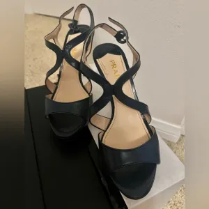 Authentic Prada leather cross strap sandals in Navy US 7.5 In Great Condition