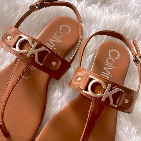 Brand New Calvin Klein Cognac Ankle Strap Thong Sandals Gold Tone Metal Logo