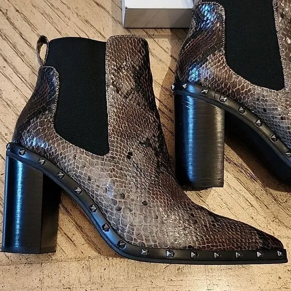 Charles David chelsea snakeskin boots size 7 New only worn one time with box