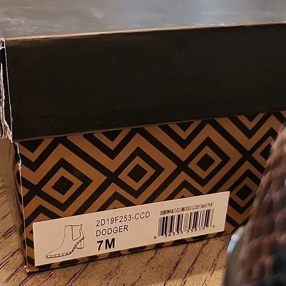 Charles David chelsea snakeskin boots size 7 New only worn one time with box