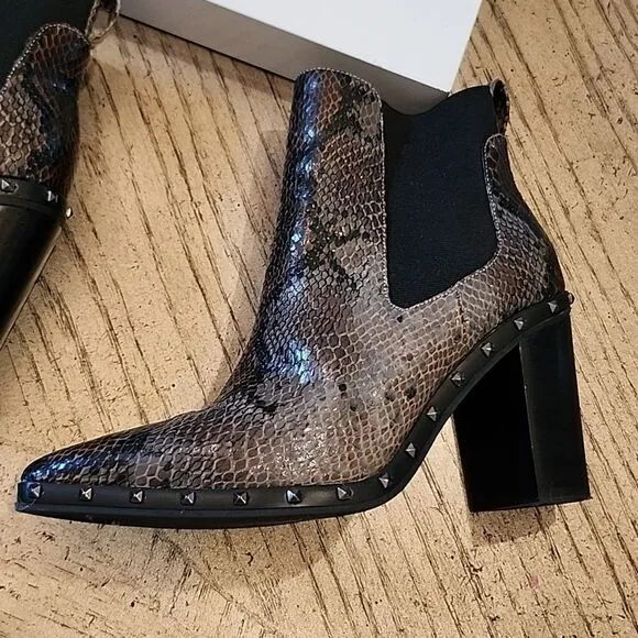 Charles David chelsea snakeskin boots size 7 New only worn one time with box
