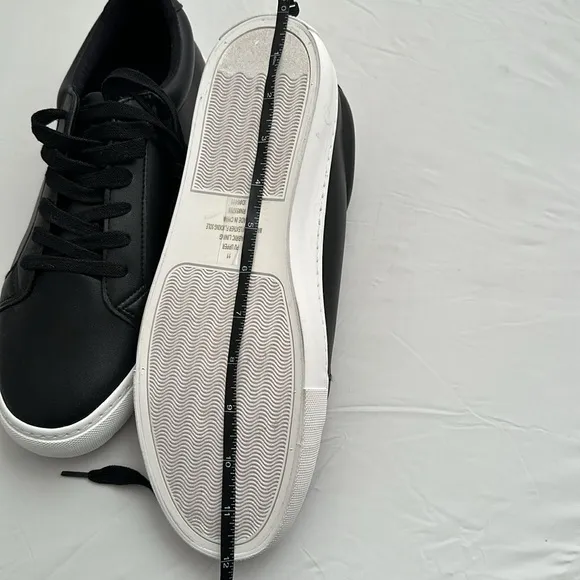 Express black leather low top sneakers