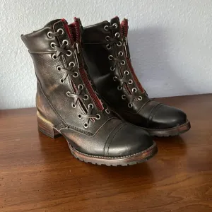 Freebird by Steven Brown and Red Liverpool Boots