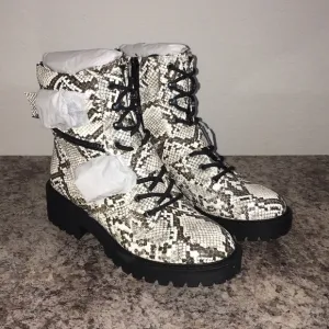 G by Guess Snakeskin Combat Boots