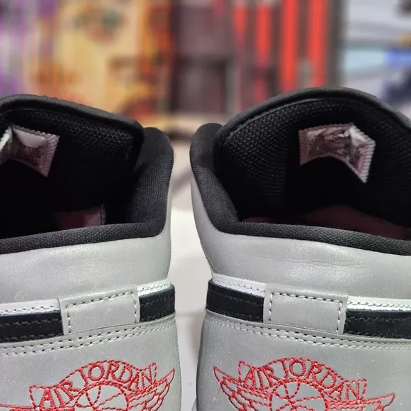 Jordan Black and White Low-Top Sneakers with Padded Collar