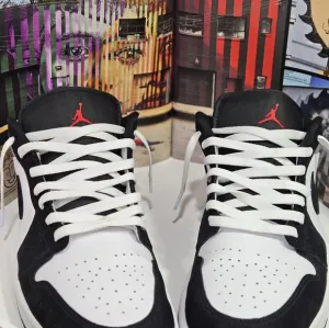Jordan Black and White Low-Top Sneakers with Padded Collar