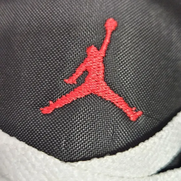 Jordan Black and White Low-Top Sneakers with Padded Collar
