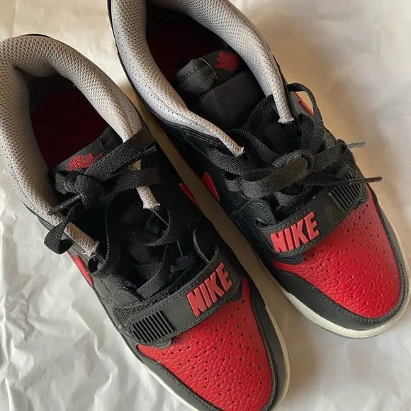 Jordan Youth Black and Red Low top Sneakers