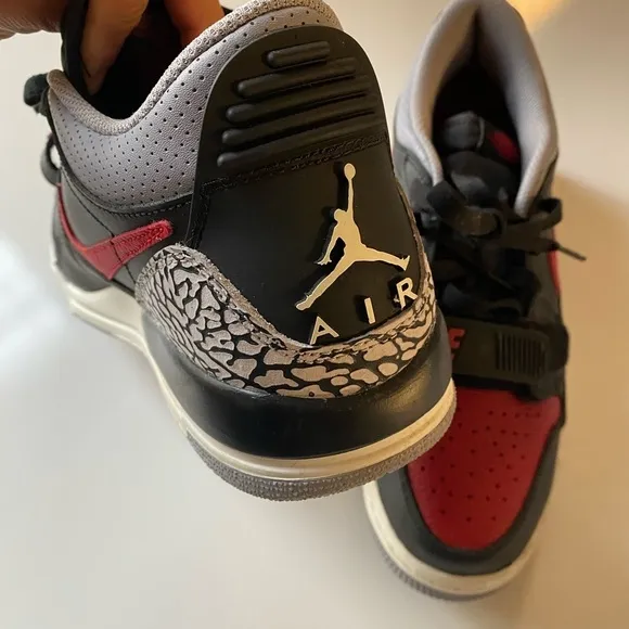 Jordan Youth Black and Red Low top Sneakers