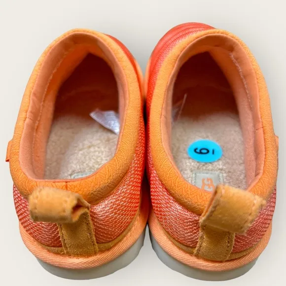 NEW! UGG Junior/Women’s slip on sandals. Neon Orange. Soft cushioned comfortable