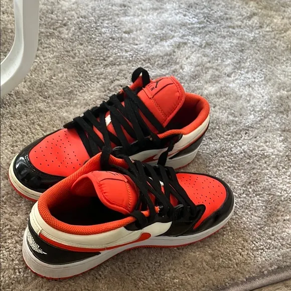 Nike Air Jordan Low Black and Orange Sneakers