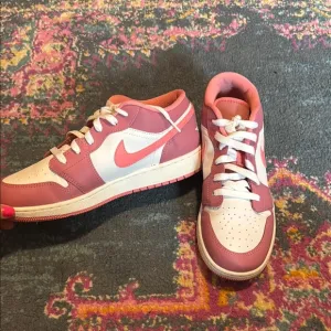 Nike Pink and White Low-Top Sneakers