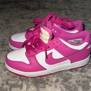 Nike Pink and White Sneakers Classic Design