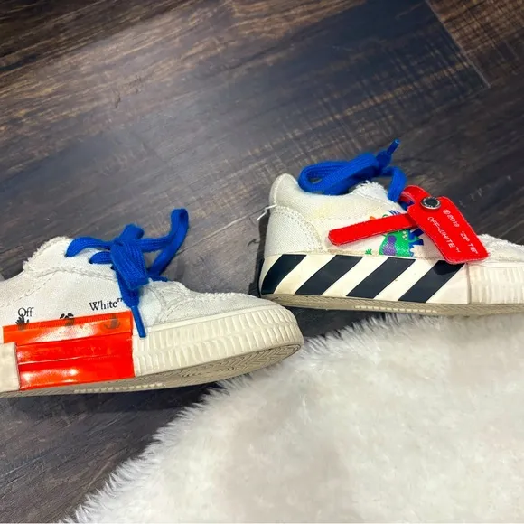 Off-White authentic white vulcanized low top sneakers. EU size 25 toddler boys