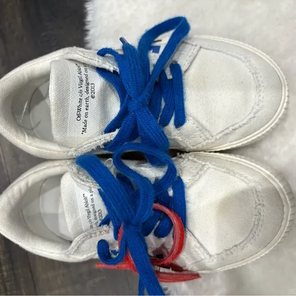 Off-White authentic white vulcanized low top sneakers. EU size 25 toddler boys