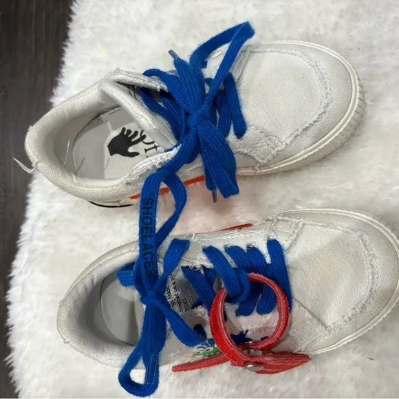 Off-White authentic white vulcanized low top sneakers. EU size 25 toddler boys