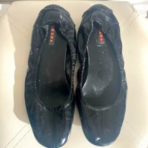 PRADA PATENT LEATHER FLATS