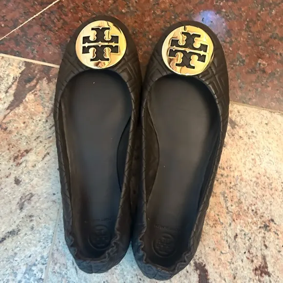 Tory Burch brown with gold emblem flats