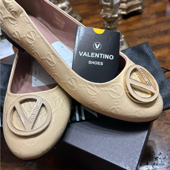 Valentino Beige Flats with Gold Logo New with dust bag/box $479