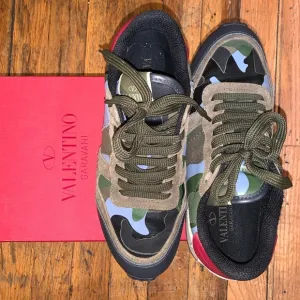 Valentino low top camouflage stud sneakers